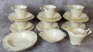 An Alfred Meakin Art Deco part tea service comprising six teacup & saucers, six side plates, sugar