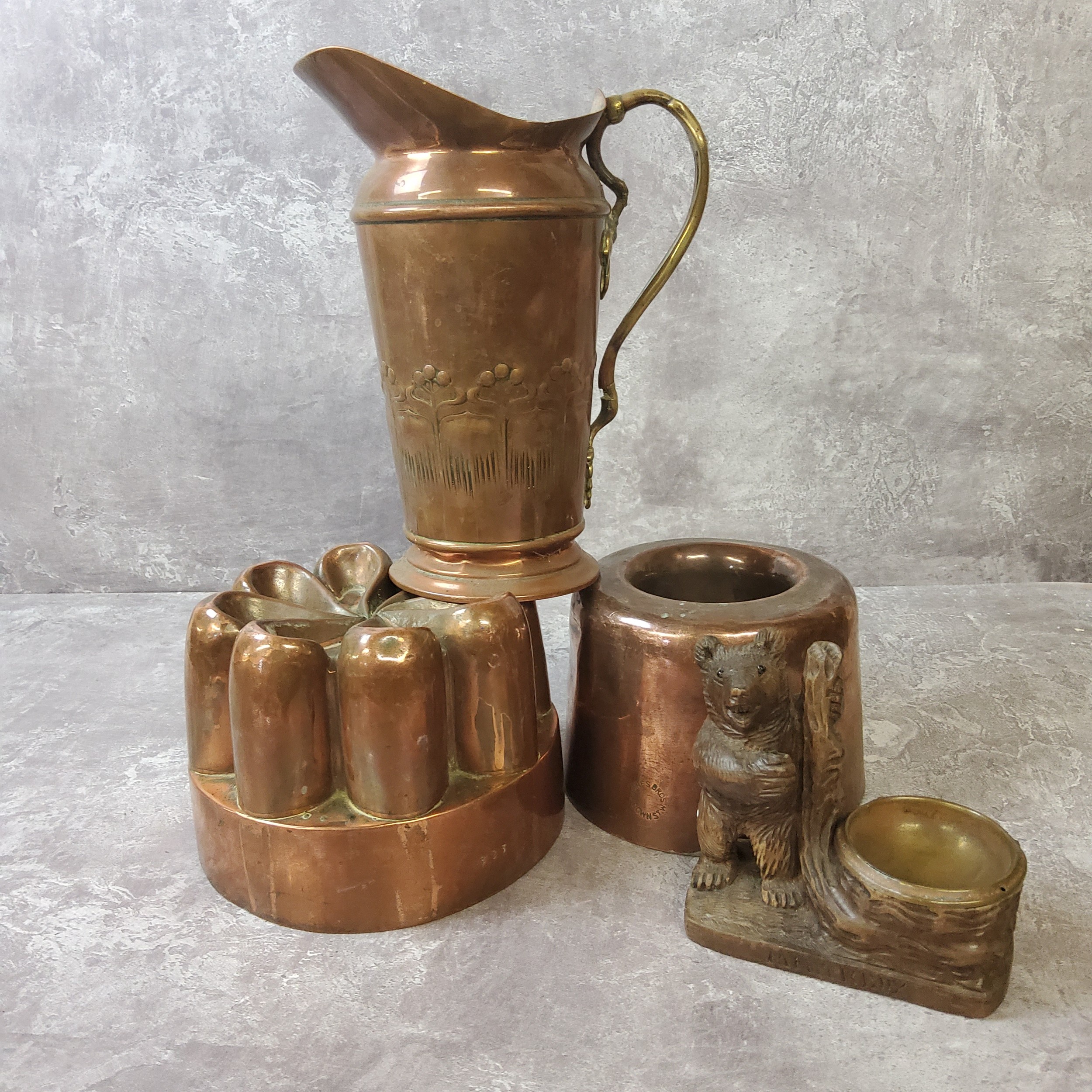 A Victorian copper jelly mould c.1900 of spiralling form; another circular mould by Jones Bros 4 - Image 4 of 4