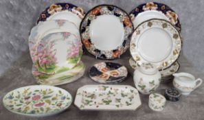 A pair of Royal Albert Heirloom pattern plates; six Royal Albert Blossom Time pattern side plates; a
