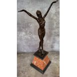 After Demetre Chiparus/An Art Deco style bronze figure, the Egyptian dancer standing with arms