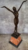 After Demetre Chiparus/An Art Deco style bronze figure, the Egyptian dancer standing with arms