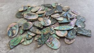A collection of jeweller's abalone pendant blanks