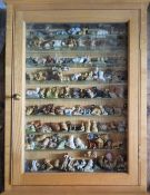 Wade Whimsies - a bespoke Ash display cabinet containing over 100 Wade Whimsies including Disney
