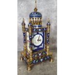 A French style cloisonne mantel clock, architectural case with five finials, white dial, Roman