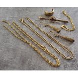 Two 9ct gold fine necklaces (one af); a 9ct gold fine bracelet; a 9ct gold bar brooch set with three