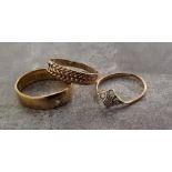 A 22ct gold band set with a round diamond approx. 3pts 3.79g; a 9ct rose gold keepers ring 1.22g; an