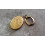 A 9ct gold oval locket engraved with swags, 8.15g gross; a 9ct rose gold double side open locket 1.