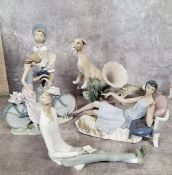 Lladro including figure of a young girl riding a bicycle; a Flapper girl reclining on a day bed (