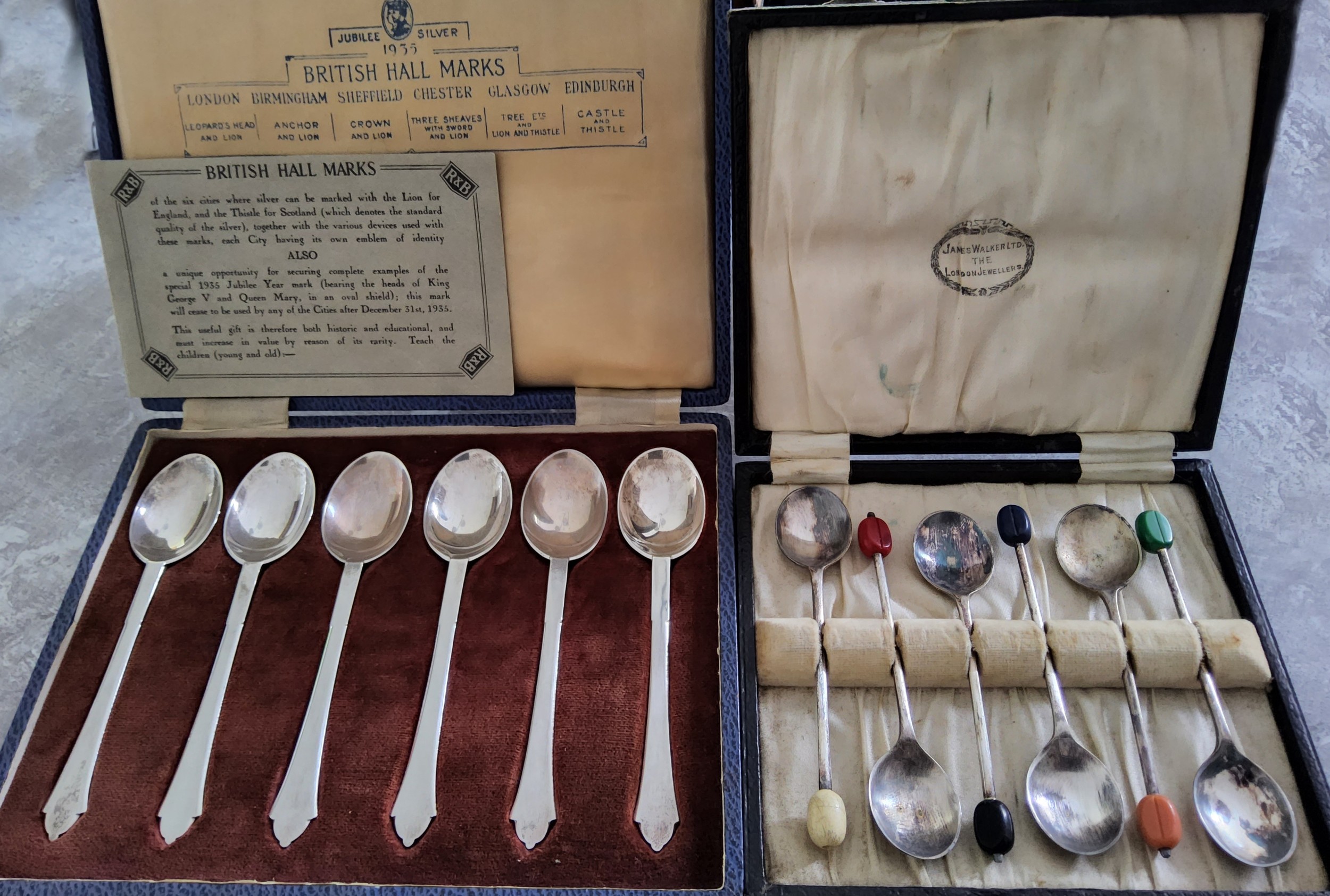 A cased set of silver George V Jubilee teaspoons each hallmarked with a different Assay Office,