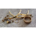 A 9ct gold wedding band size??, H Samuel, Birmingham 1972 6.75g; a 9ct gold broken bangle, 3.43g;