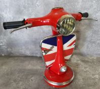 A good novelty table lamp in the form of a Vespa, red with the leg shield decorated with the Union