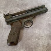 A .22” Webley Premier Series “E” air pistol, number 213 and numbers “2 1” beneath left grip, with