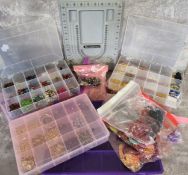 Jewellery making kit including six compartmentalised plastic boxes containing a quantity of