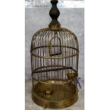 A late 19th/early 20th century turned ebony and brass domed bird cage