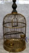 A late 19th/early 20th century turned ebony and brass domed bird cage