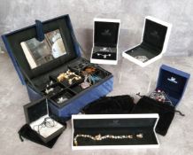 Swarovski Jewelery (sic) including a clear, an amber & a blue crystal jigsaw piece necklaces;