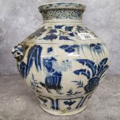 A Qing type Chinese porcelain underglazed blue and white temple vase, decorated with intermitted