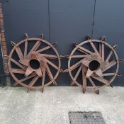 Agricultural salvage - a pair of substantial metal tractor wheels circa 1930's please note buyer