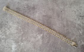 A yellow & white gold brick link bracelet 13.58g