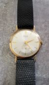 An Avia 9ct gold gentleman's wristwatch, Swiss 17 jewels movement; silver dial, gold batons & hands,