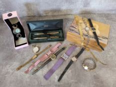 A Cross pen & pencil set engraved Englehard CLAL 10 years, boxed; various lady's watches including a