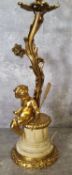 Lighting - an early 20th century gilt metal and alabaster table lamp base in the form of a cherub