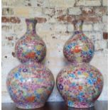 A pair of impressive Chinese double gourd vases, with colourful millefleur Canton enamel decoration,