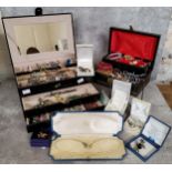 Two jewellery boxes containing costume jewellery including necklaces, earrings, bracelets etc.; a