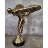 A large silver plated solid cast metal sculpture of The Spirit of Ecstasy, raised a round marble
