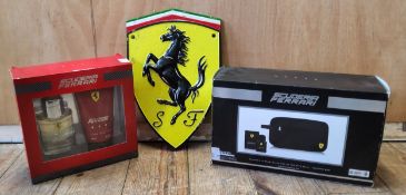 Ferrari interest - a Ferrari Cavallino Rampante Cast Plaque 30 x 20cms; Ferrari Red & Black