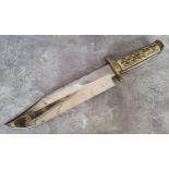 A Bexfield of Sheffield Bowie knife, horn scales, brass cross guard, jimping to blade, 25.5cm blade,