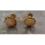 A pair of 9ct gold claw set cameo earrings, open screw backs 2.6g