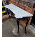 Black cast iron table with white marble top