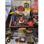 A quantity of vintage Meccano including wheels, clockwork motor, wheels & tyres, cogs etc. qty