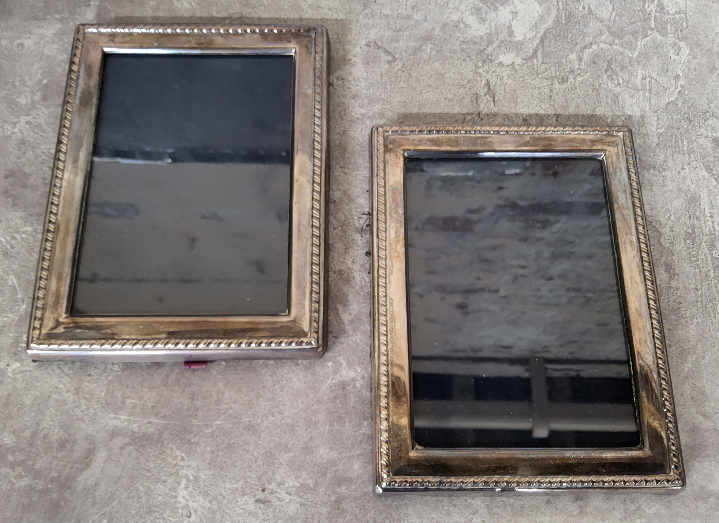 A pair of silver photograph frames, 16 x 12cms, Ron Carr, Sheffield, 1988