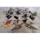 A Dinky No. 719 Battle of Britain Spitfire Mk II; a Dinky No. 721 Junkers Ju 87B Stuka with bomb; an
