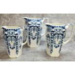 A set of three graduated blue and white jugs by F & Sons Tyne pattern Burslem, 21cm High