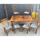 Victorian oak wind out dining table with six chairs, including winding handle, four dining and a