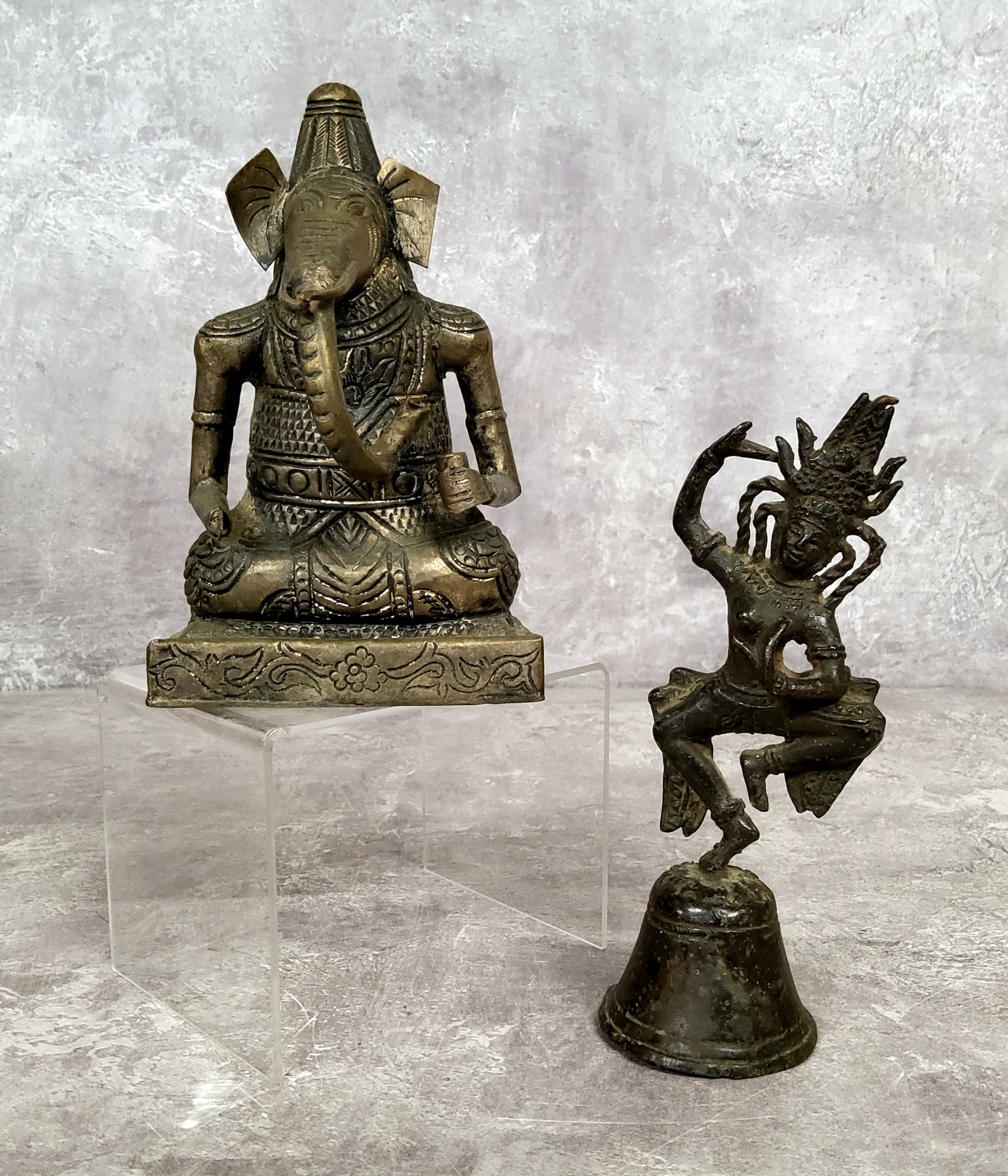 An early South East Asian Kymer bronze of a dancer and an Indian library figure of Ganesha,