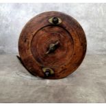 A substantial Victorian Scarborough reel with brass mounts c.1880, 21cm diameter