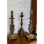Lighting - a pair of early 20th century metal candkesticks converted to lamp bases; a 19th century