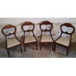 A set of four Victorian mahogany balloon back bedroom chairs, bold turned and reeded legs c.1880