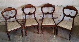 A set of four Victorian mahogany balloon back bedroom chairs, bold turned and reeded legs c.1880