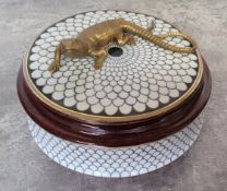 A Continental porcelain circular box and cover, the cover mounted with a bronzed metal lizard,