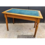 An Edwardian oak teal tooled leather inlaid desk H73cm x W115cm x D68cm