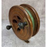 An early 20th century Scarborough oak sea fishing reel