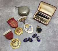 A 9ct gold mounted tortoiseshell cheroot holder in original Moroccan leather fitted case; a pair