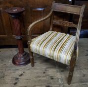 A William IV type mahogany torchere; a Regency library chair (2)