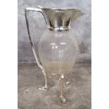 A silver plated mounted glass claret jug after a Design By Christopher Dresser, hinged cover the