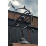 A painted metal armillary sphere